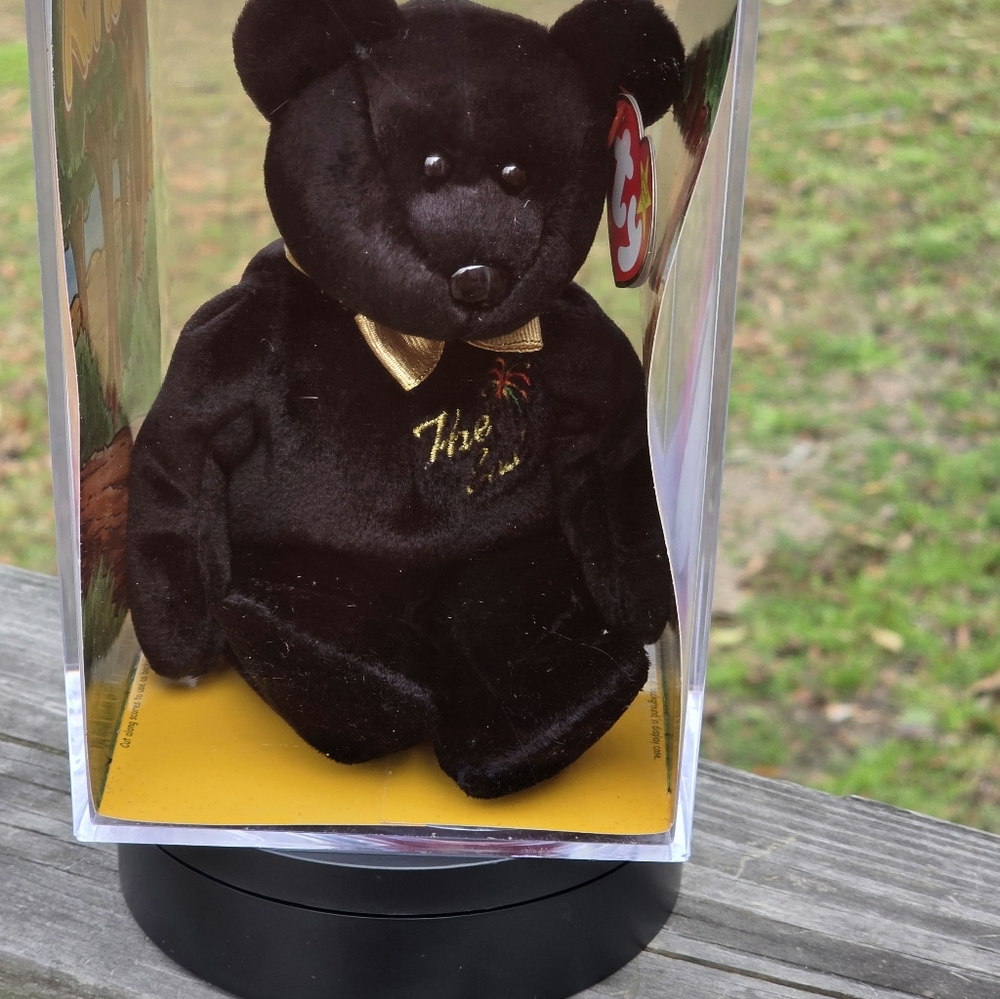 Elegant Black and Gold Plush Bear